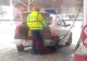 LEGAL sau ILEGAL? Polițist surprins cu bidoanele în portbagaj la o benzinărie din Bârlad!